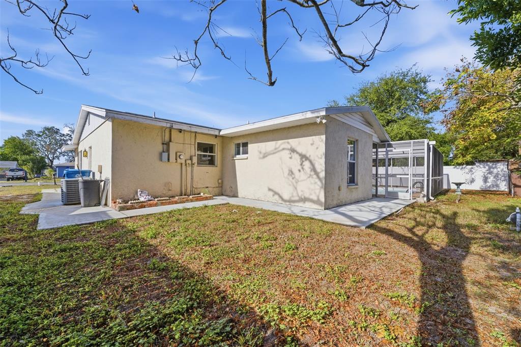 6229 Dalton Street Spring Hill, FL 34606 - Photo 30 of 44 a front view of house with garage
