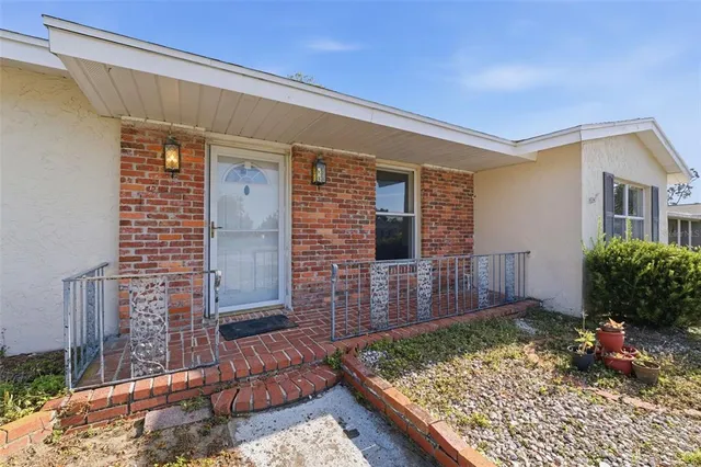 a view of a porch with a bench
