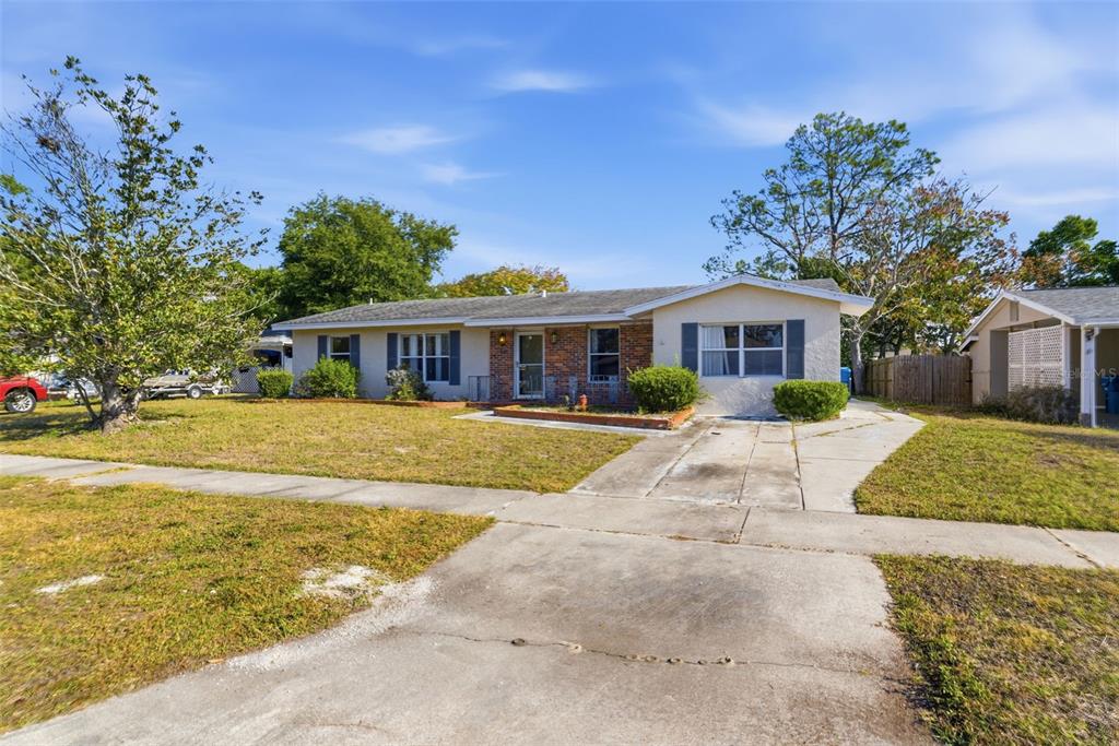 6229 Dalton Street Spring Hill, FL 34606 - Photo 33 of 44 a view of house with swimming pool