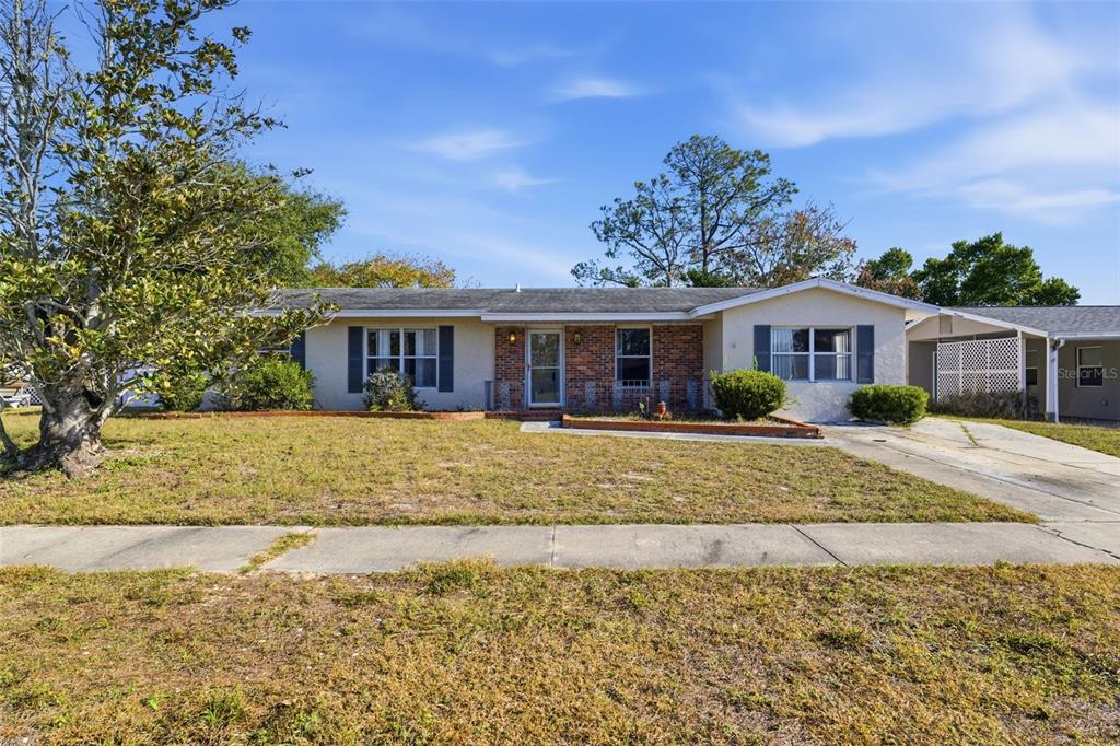 6229 Dalton Street Spring Hill, FL 34606 - Photo 35 of 44 a view of a house with a swimming pool