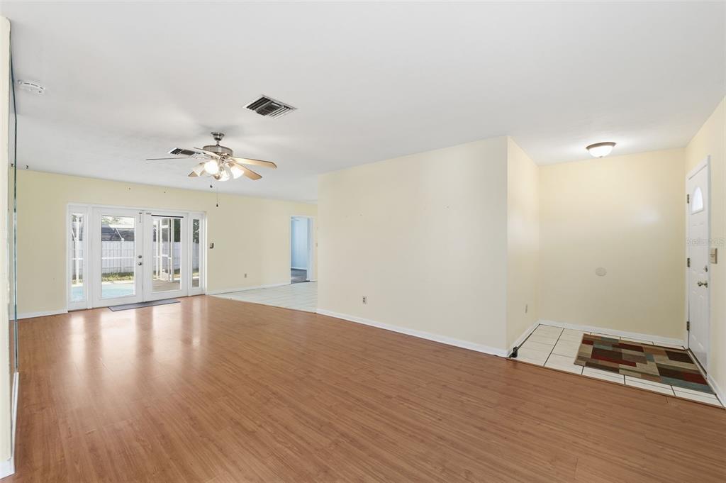 6229 Dalton Street Spring Hill, FL 34606 - Photo 4 of 44 wooden floor in an empty room