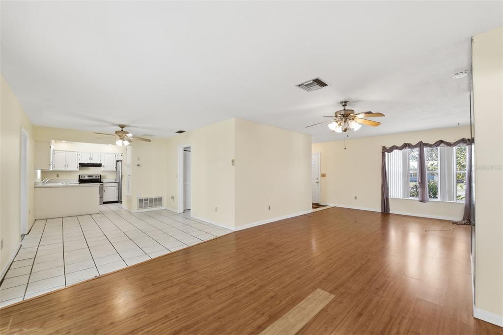 6229 Dalton Street Spring Hill, FL 34606 - Photo 7 of 44 a view of a livingroom with wooden floor
