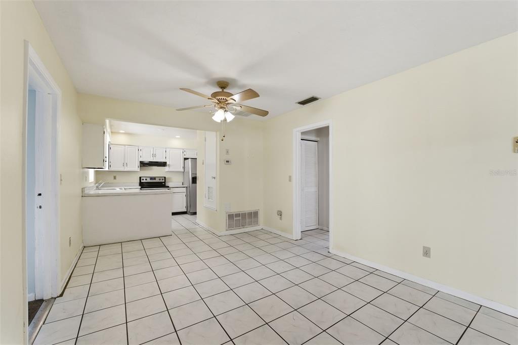 6229 Dalton Street Spring Hill, FL 34606 - Photo 8 of 44 a view of an empty room and kitchen view
