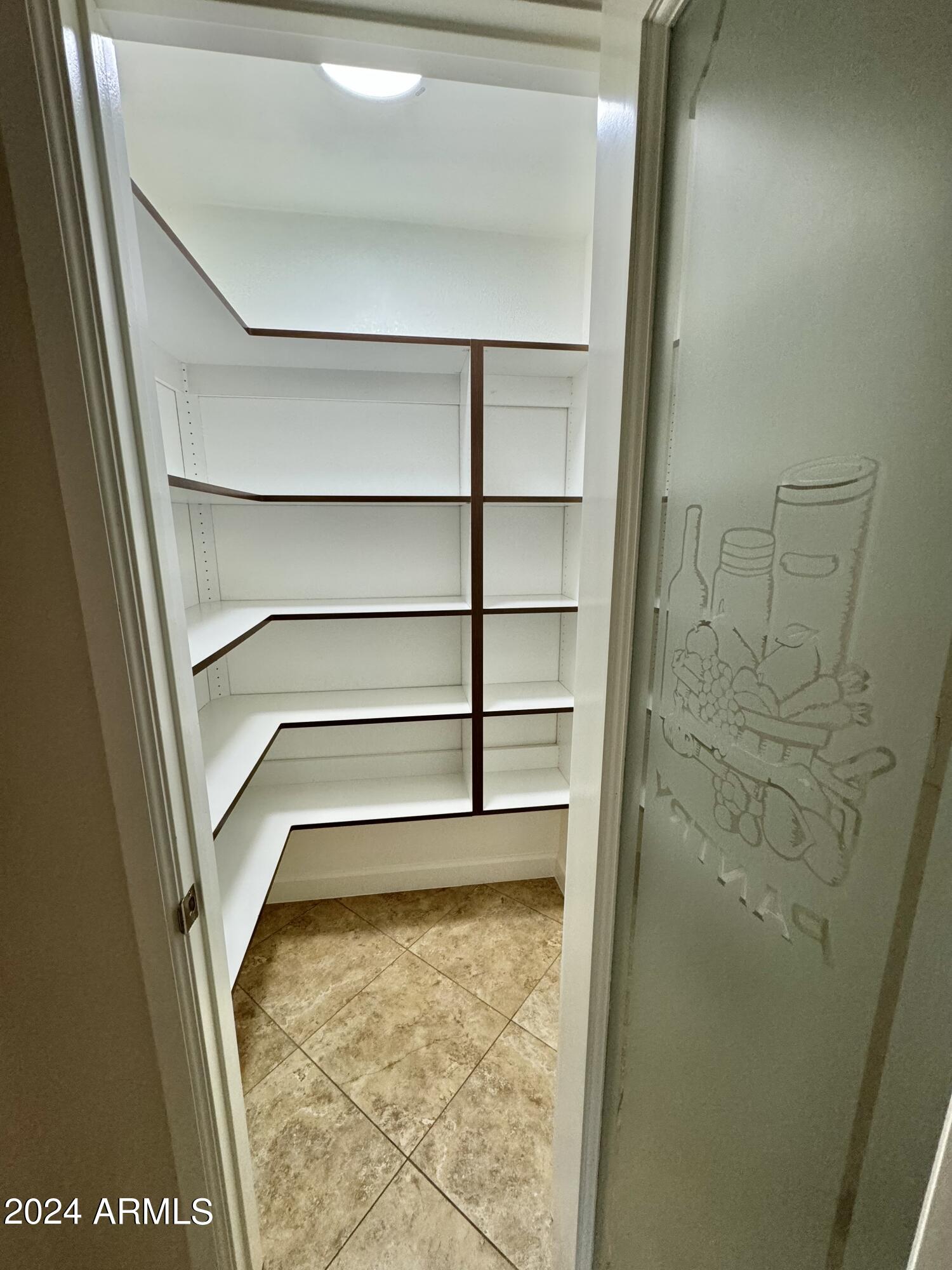 15402 North 57th Street Scottsdale, AZ 85254 - Photo 18 of 35 a view of a room with rack on the wall