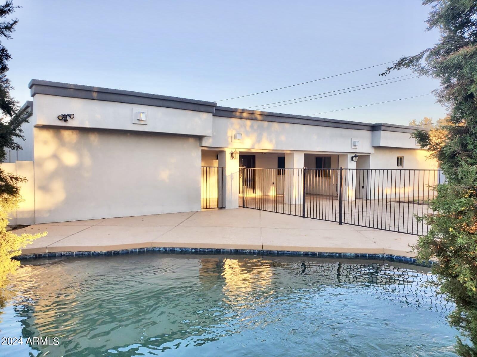 15402 North 57th Street Scottsdale, AZ 85254 - Photo 10 of 35 a view of swimming pool with outdoor seating