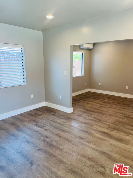2807 Buckingham Road, Unit 1/2 Los Angeles, CA 90016 - Photo 4 of 10 a view of an empty room and window