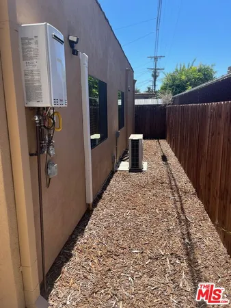 a view of balcony with furniture