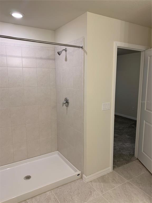 2559 Buena View Road Kissimmee, FL 34746 - Photo 8 of 17 a bathroom with a shower