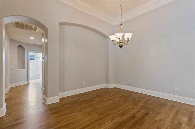 a kitchen with stainless steel appliances a refrigerator and a sink