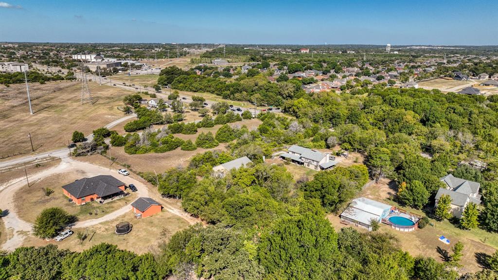 1922 West Pleasant Run Road DeSoto, TX 75115 - Photo 2 of 8 an aerial view of residential houses with outdoor space