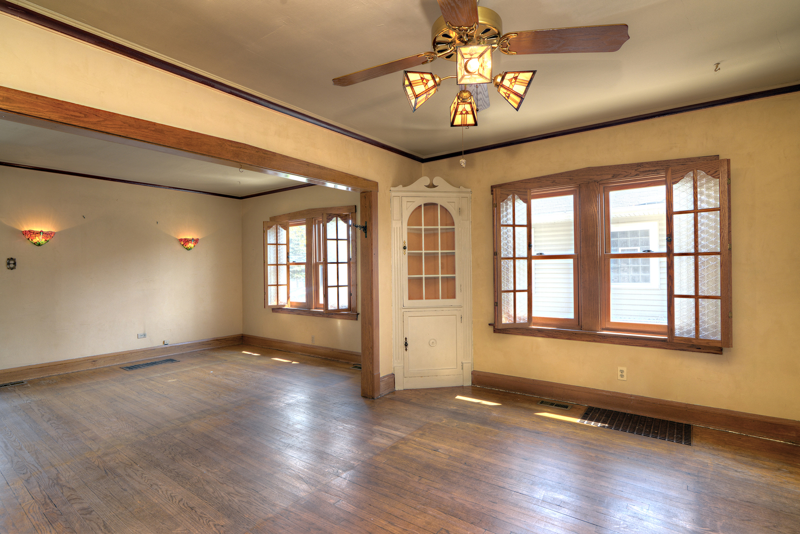 4162 Blanchan Avenue Brookfield, IL 60513 - Photo 16 of 39 an empty room with wooden floor and windows