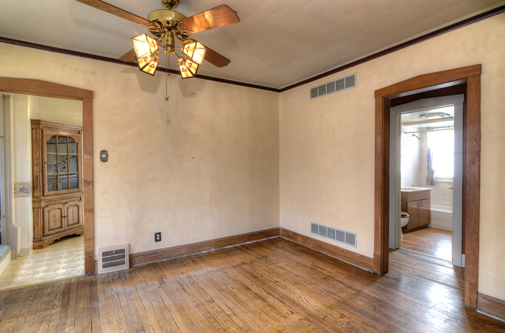4162 Blanchan Avenue Brookfield, IL 60513 - Photo 17 of 39 a view of a big room with wooden floor closet and windows