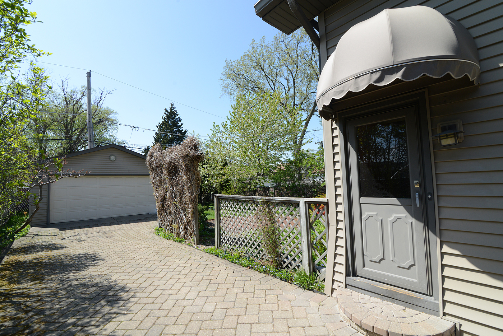 4162 Blanchan Avenue Brookfield, IL 60513 - Photo 36 of 39 a view of a door of the house and a yard