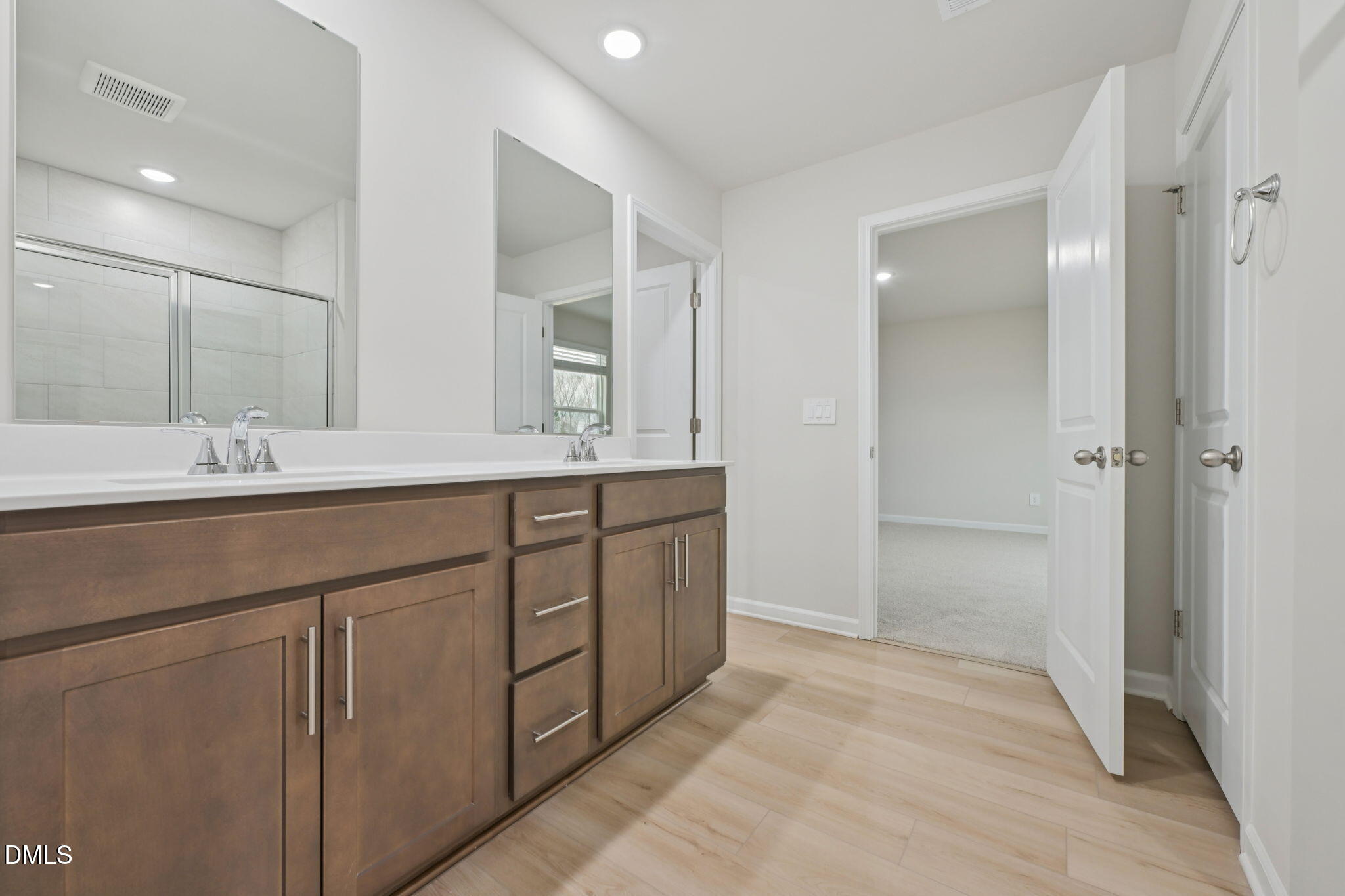 2147 Topsail Road Durham, NC 27703 - Photo 21 of 31 a bathroom with a sink and a mirror