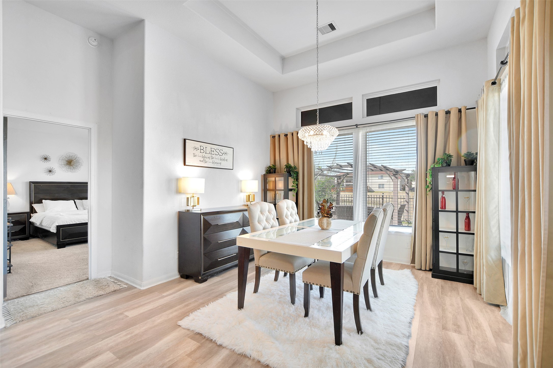 27 Montecito Lane Manvel, TX 77578 - Photo 24 of 49 a view of a dining room with furniture window and wooden floor