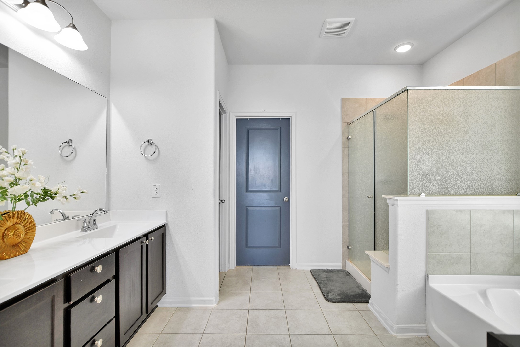 27 Montecito Lane Manvel, TX 77578 - Photo 29 of 49 a bathroom with a sink and a mirror