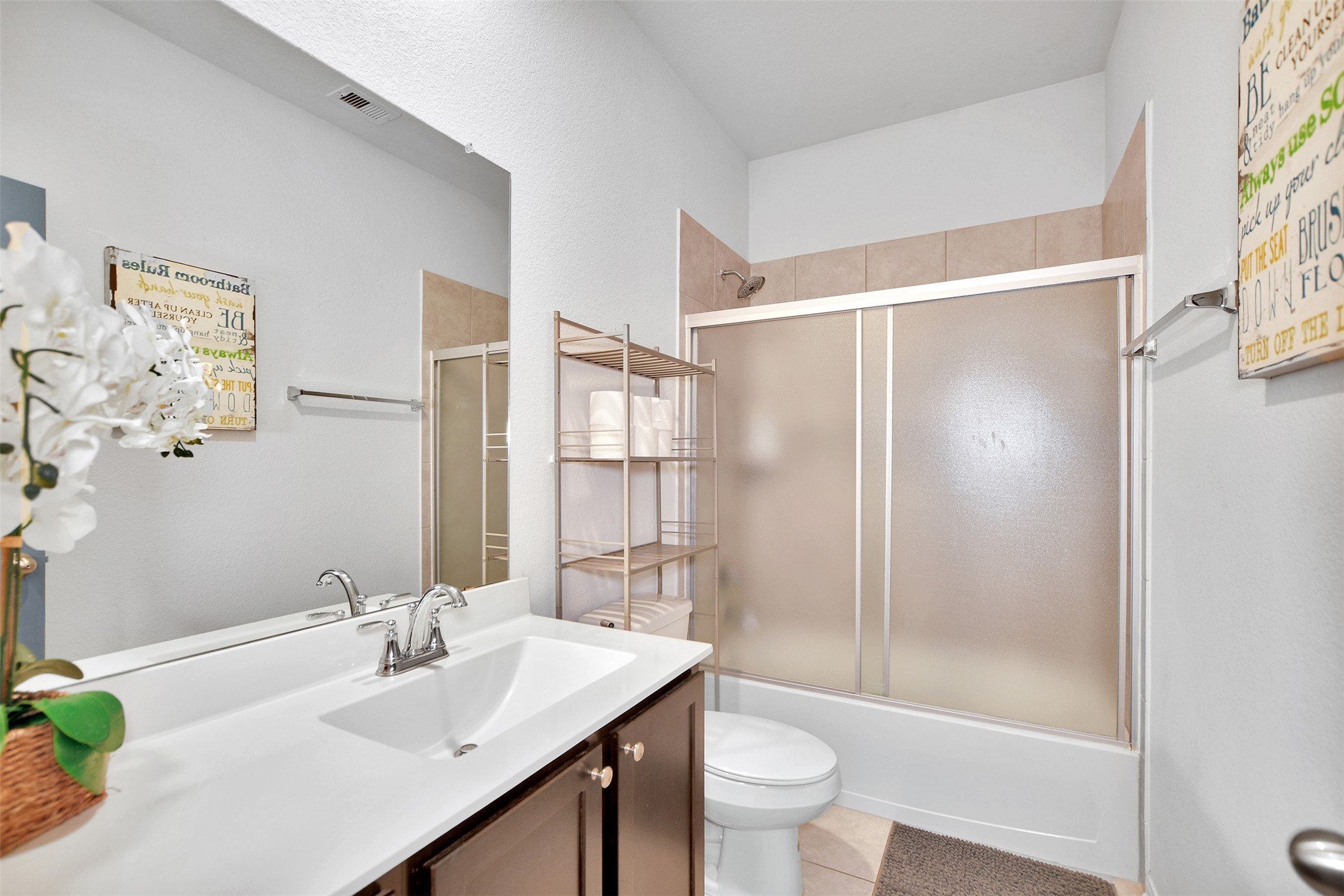 27 Montecito Lane Manvel, TX 77578 - Photo 34 of 49 a bathroom with a sink toilet and shower