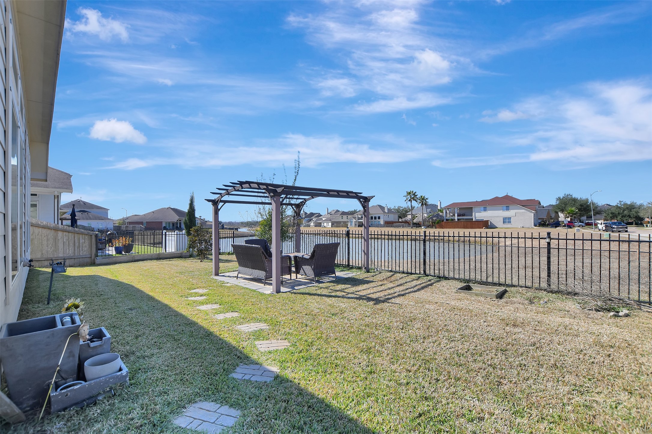 27 Montecito Lane Manvel, TX 77578 - Photo 39 of 49 a view of a swimming pool with a lounge chair
