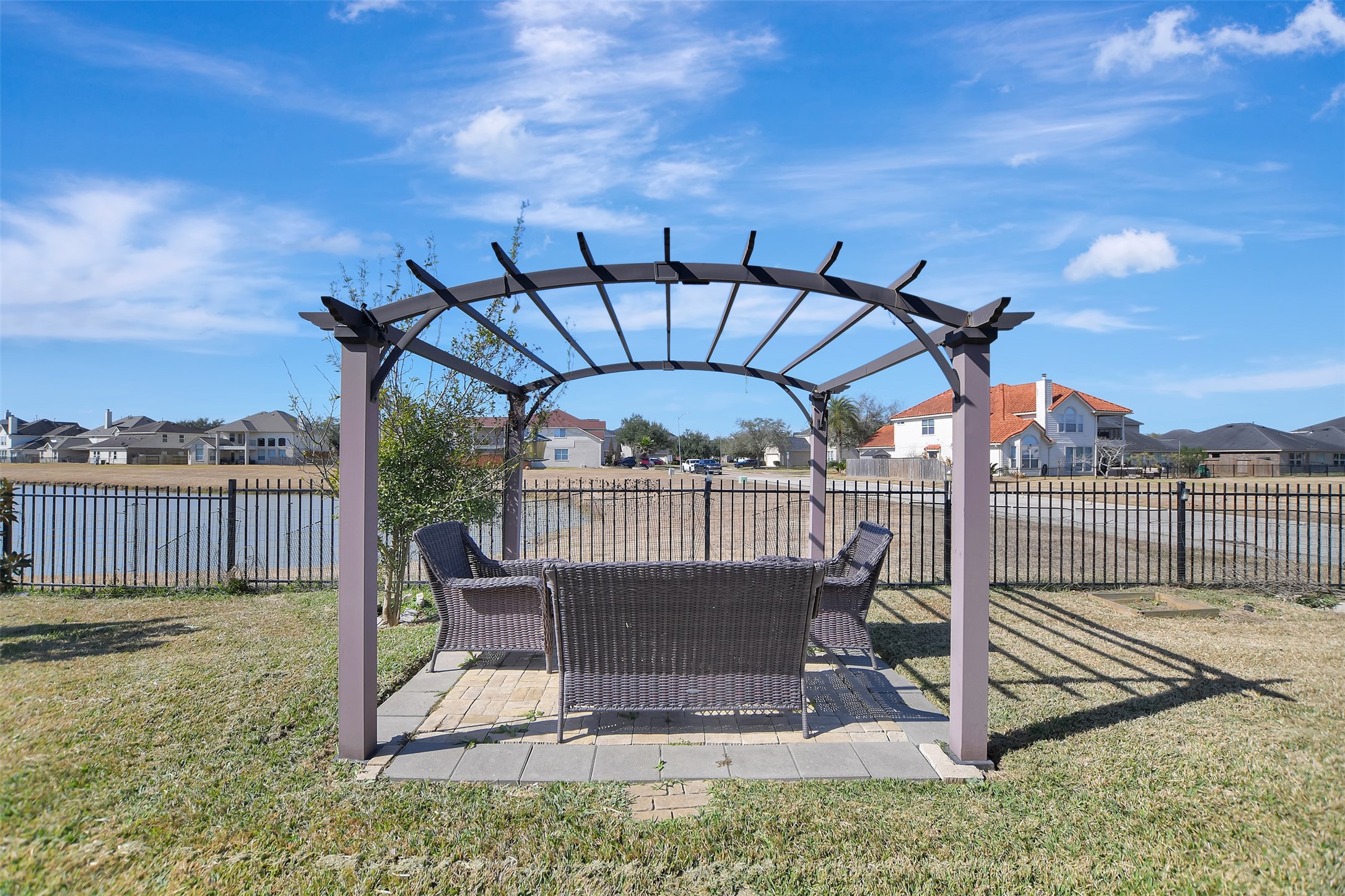 27 Montecito Lane Manvel, TX 77578 - Photo 40 of 49 a view of a swimming pool with a patio