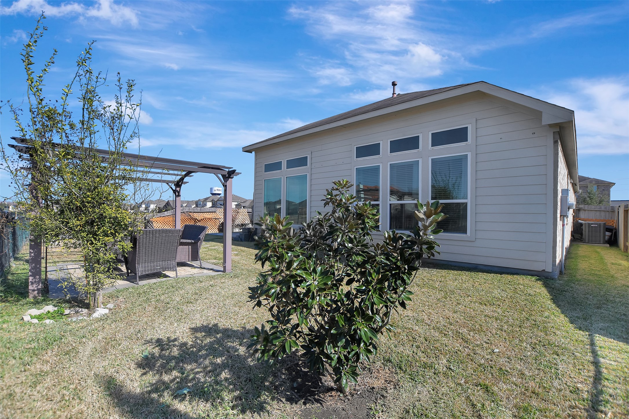 27 Montecito Lane Manvel, TX 77578 - Photo 41 of 49 a front view of a house with garden
