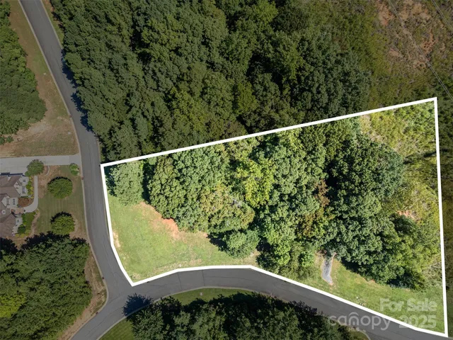 a view of a balcony with an outdoor space