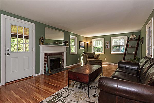 81 Chester Road Boxborough, MA 01719 - Photo 8 of 28 a living room with furniture and a fireplace
