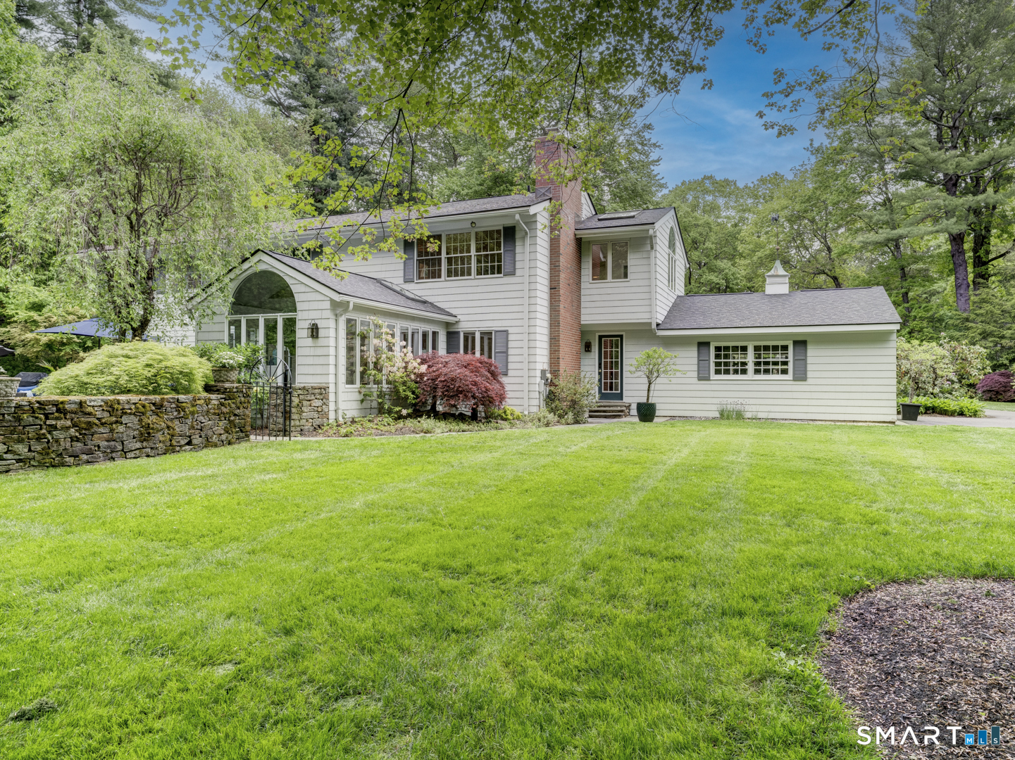 78 Windtree Street Torrington, CT 06790 - Photo 7 of 40 a front view of a house with a garden
