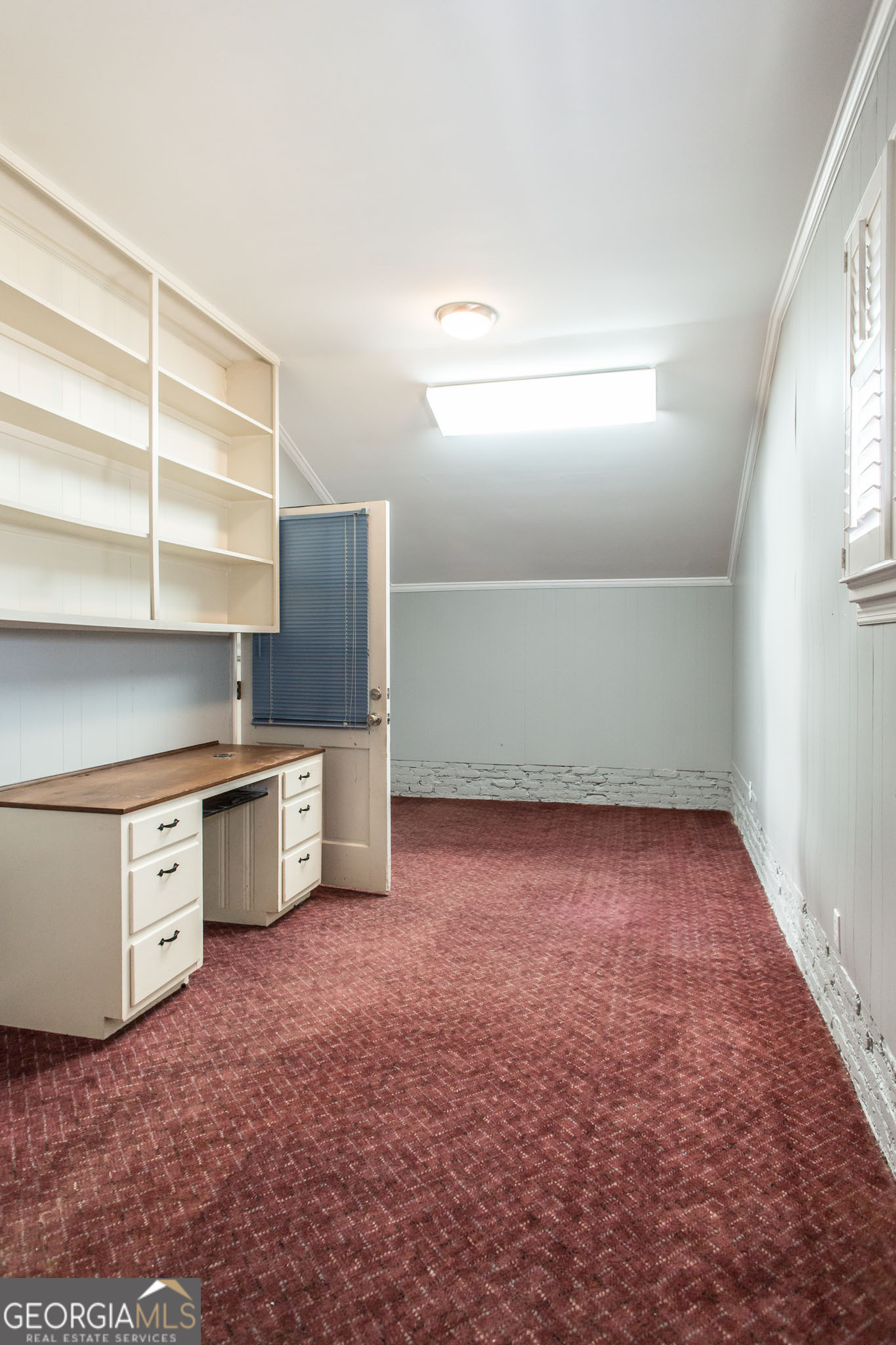 402 Preston Street Waycross, GA 31501 - Photo 19 of 43 a view of an empty room with a window