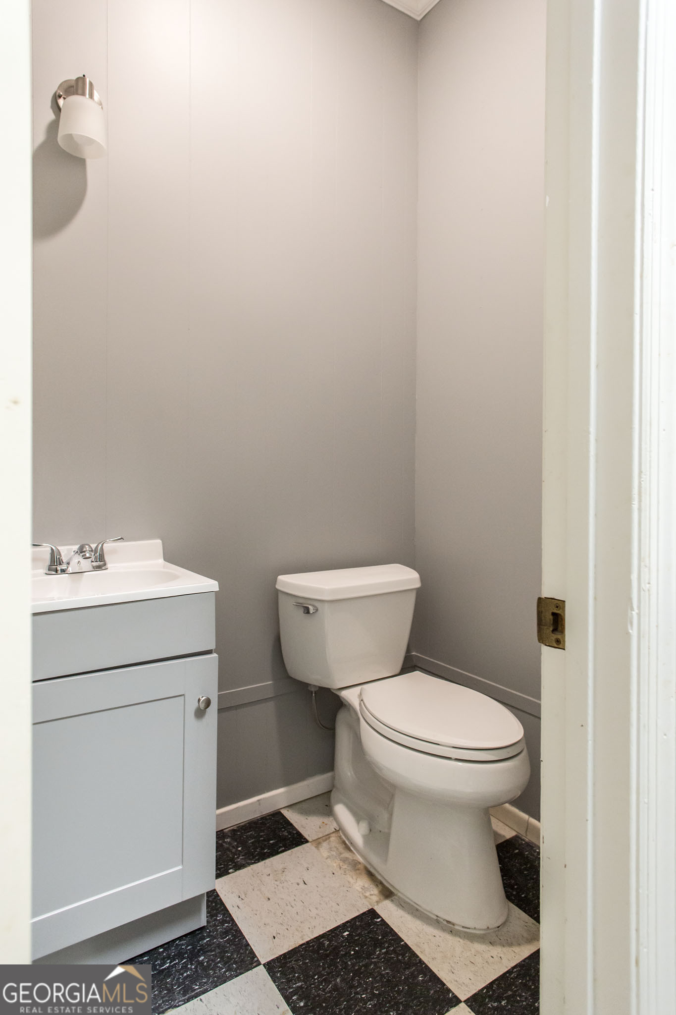 402 Preston Street Waycross, GA 31501 - Photo 21 of 43 a bathroom with a toilet and a sink