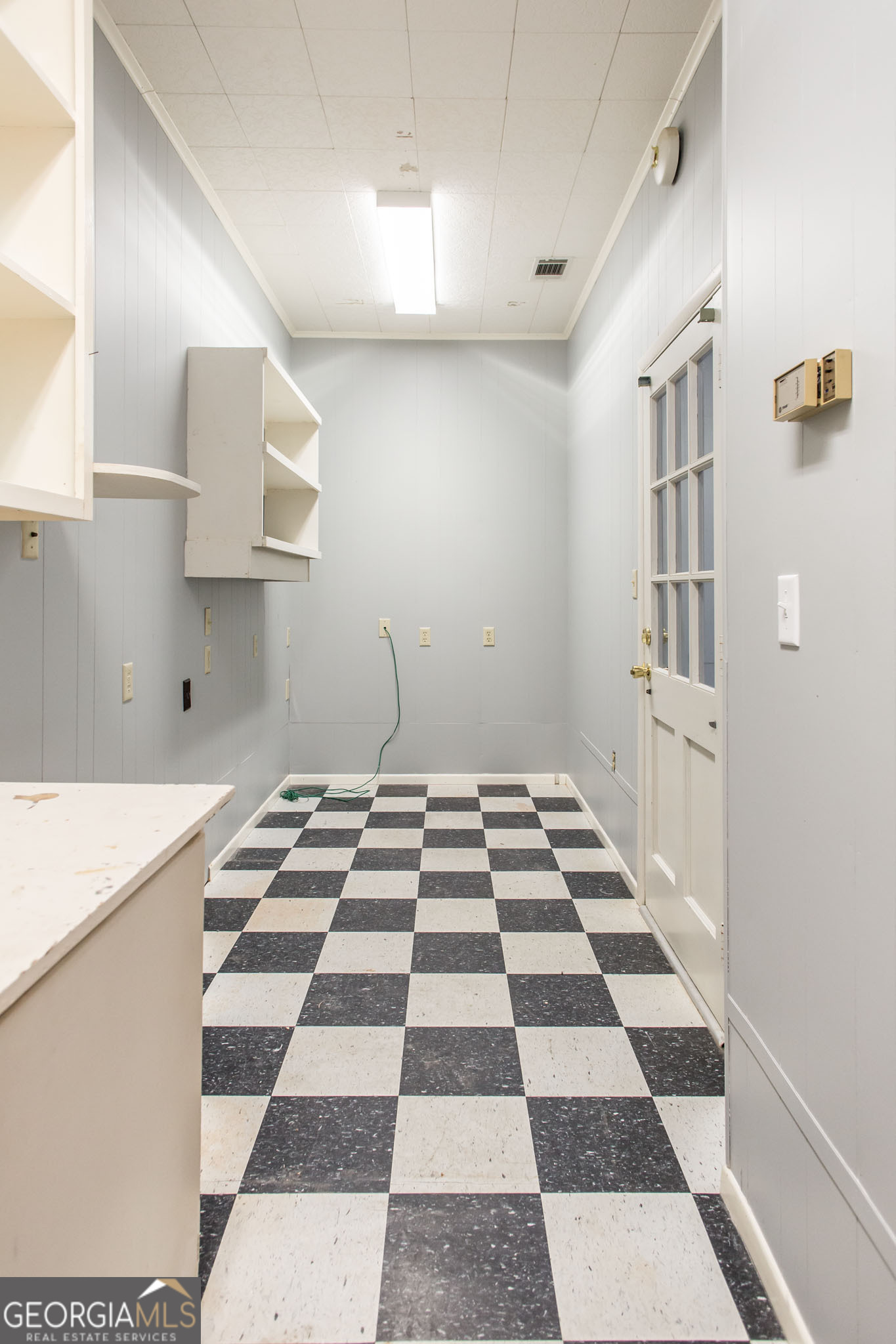 402 Preston Street Waycross, GA 31501 - Photo 22 of 43 a black and white checkered floor with a black white checkered floor
