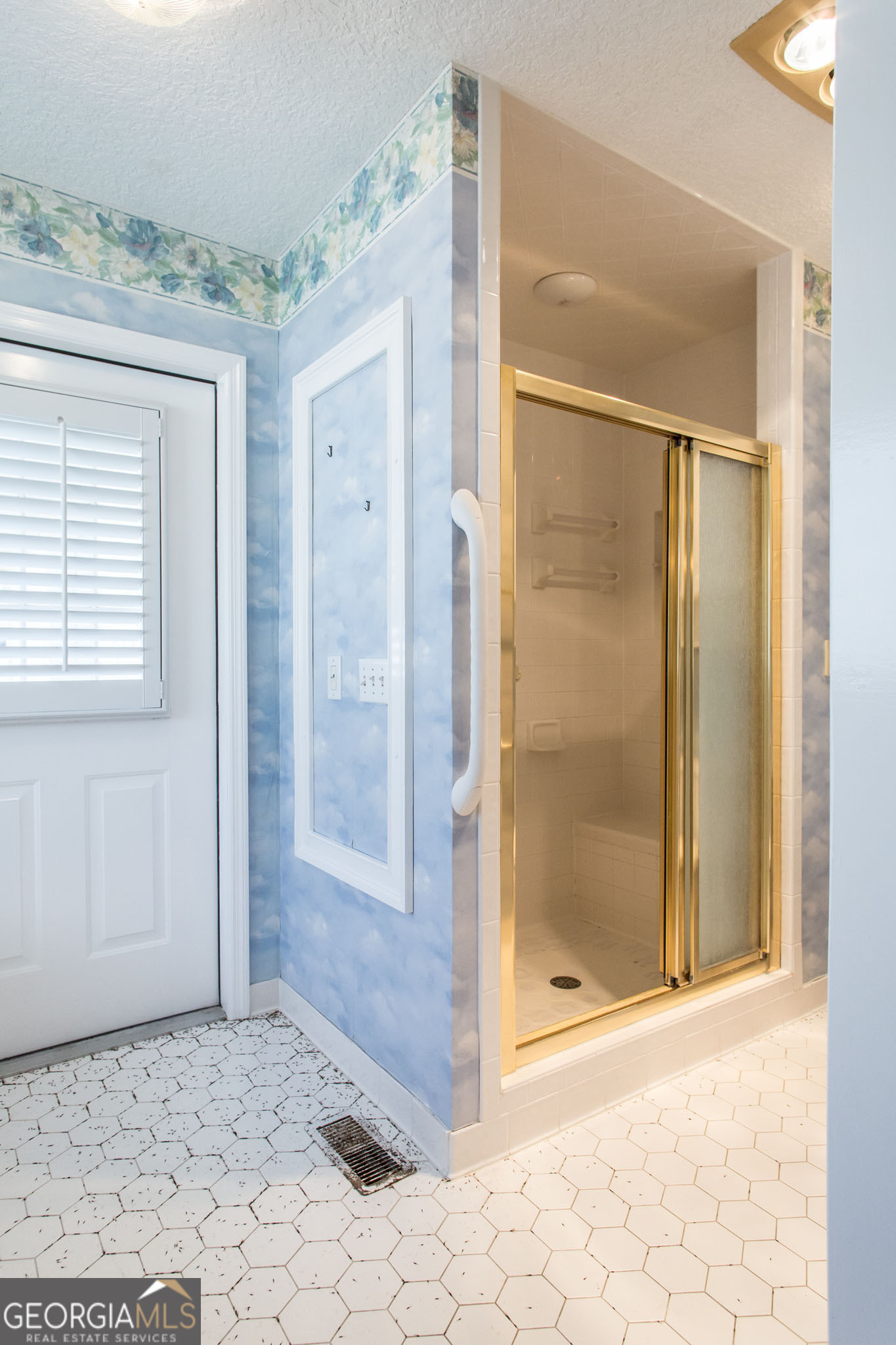 402 Preston Street Waycross, GA 31501 - Photo 32 of 43 a view of a bathroom with a shower