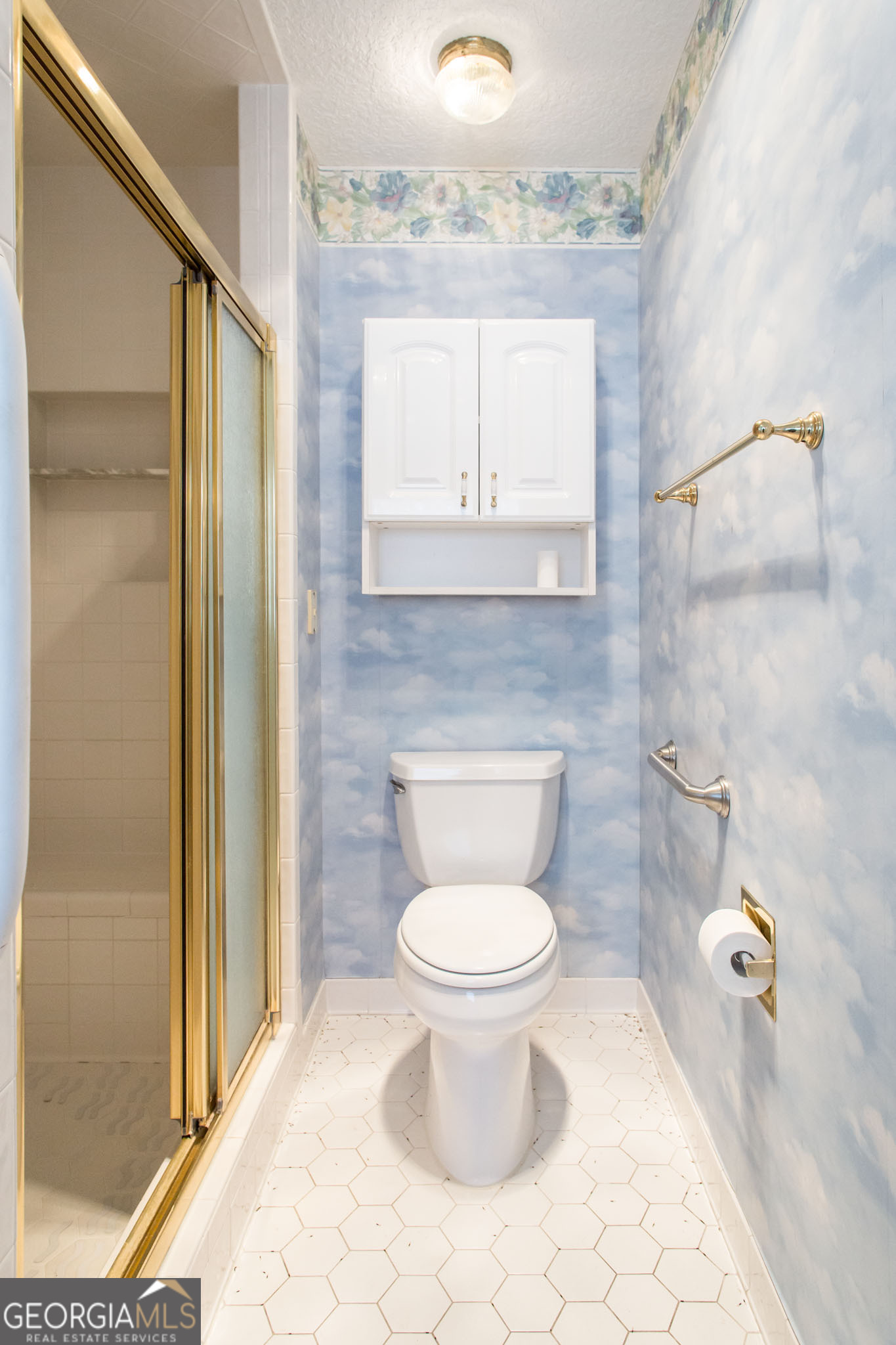 402 Preston Street Waycross, GA 31501 - Photo 34 of 43 a bathroom with a toilet sink and shower