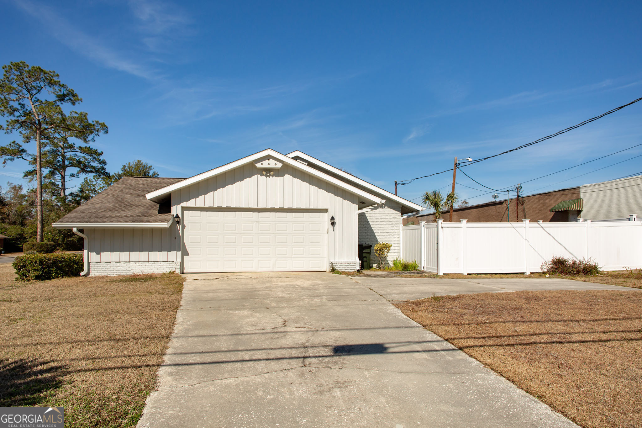 402 Preston Street Waycross, GA 31501 - Photo 40 of 43 a view of a house with a yard