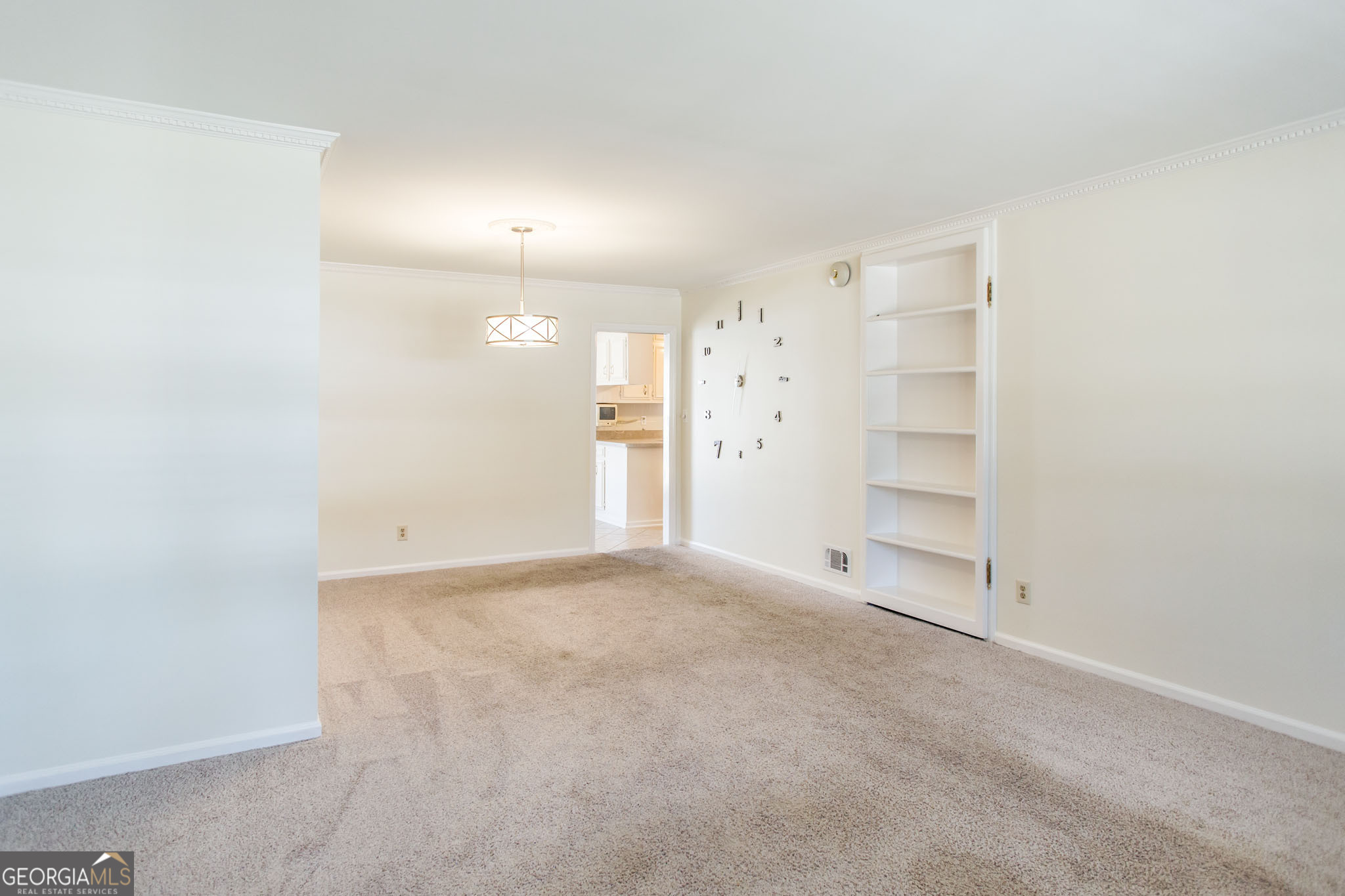 402 Preston Street Waycross, GA 31501 - Photo 5 of 43 an empty room with closet and natural light