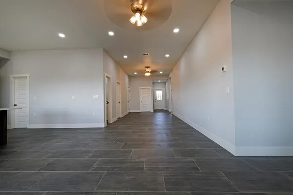 a view of hallway with a window