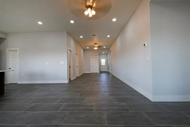 a view of hallway with a window