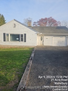 21 Acra Road Waterbury, CT 06708 - Photo 1 of 1 a front view of a house with a yard and lake view