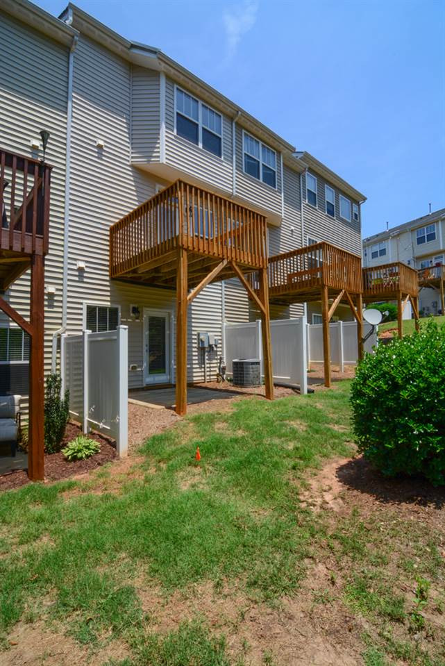 8717 Cypress Grove Run Raleigh, NC 27612 - Photo 25 of 25 Rear deck, privacy fences in between units deck