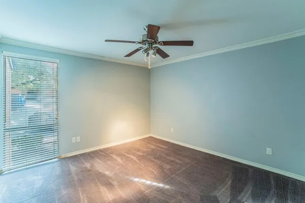 a view of a chandelier fan in a room