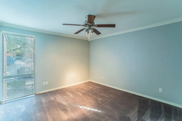a view of a chandelier fan in a room