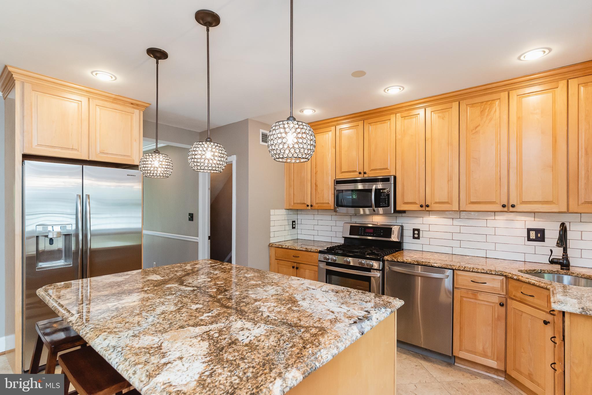84 Dunkirk Road Baltimore, MD 21212 - Photo 14 of 56 Kitchen w/granite counters, new pendant lighting.