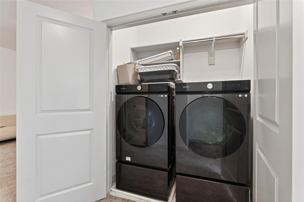 9000 Phoebe Road Frisco, TX 75035 - Photo 25 of 27 a utility room with dryer and washer