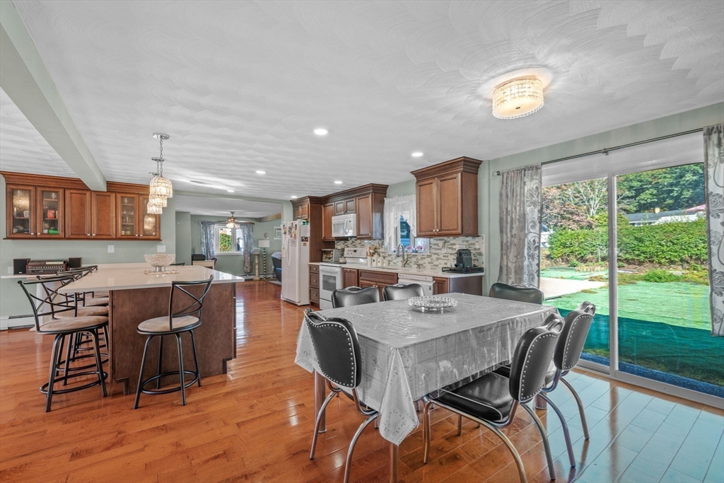 1 Reed Road Peabody, MA 01960 - Photo 11 of 31 a view of a dining room with furniture window and wooden floor