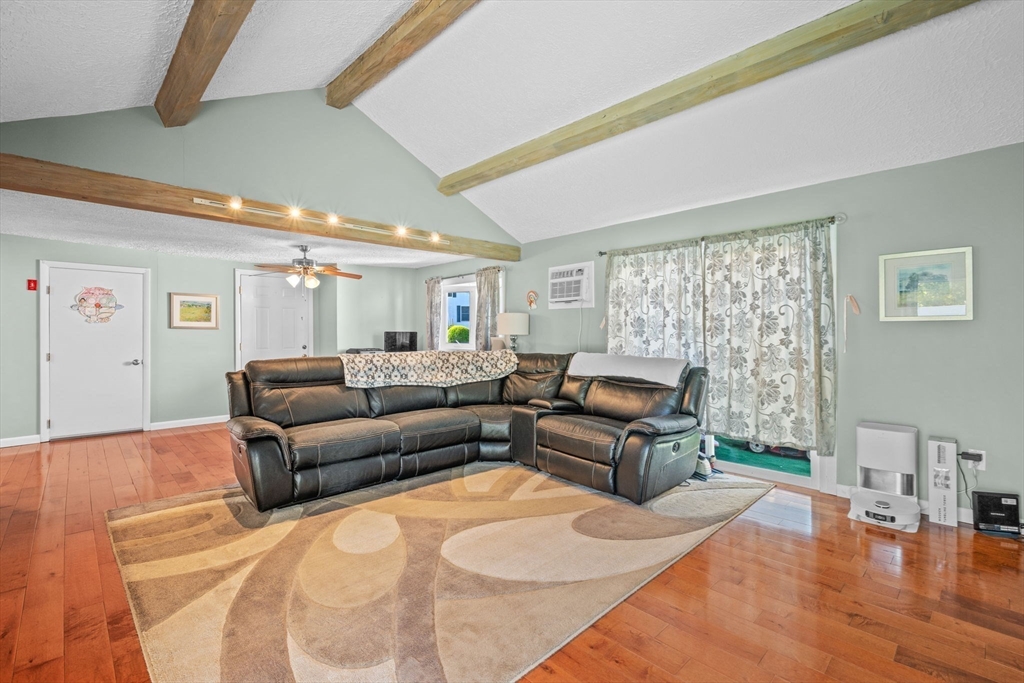 1 Reed Road Peabody, MA 01960 - Photo 15 of 31 a living room with furniture and a large window