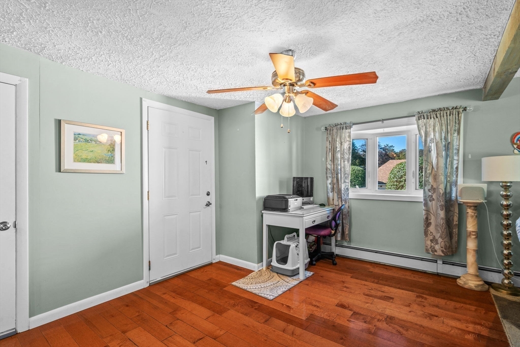 1 Reed Road Peabody, MA 01960 - Photo 16 of 31 a view of workspace with wooden floor and ceiling fan