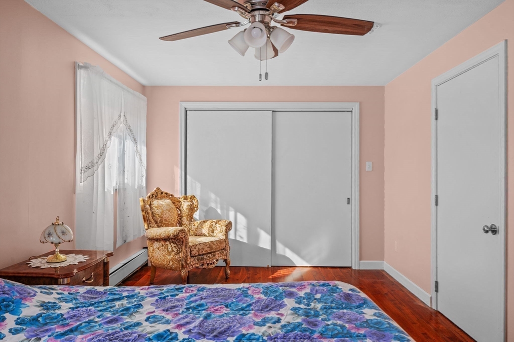 1 Reed Road Peabody, MA 01960 - Photo 20 of 31 a living room with furniture and a rug