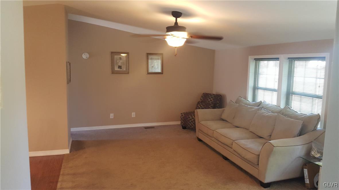 975 Bushkill Center Road Nazareth, PA 18064 - Photo 17 of 48 a living room with furniture and a window