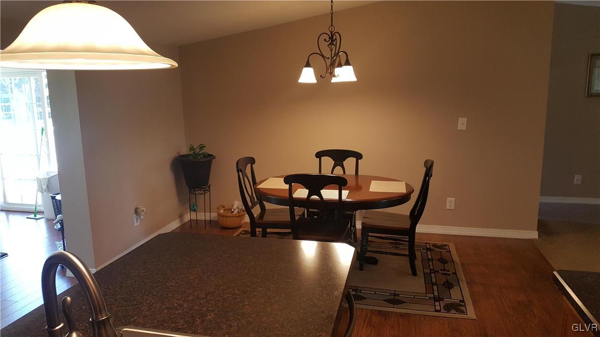 975 Bushkill Center Road Nazareth, PA 18064 - Photo 20 of 48 a view of a dining room with furniture and wooden floor