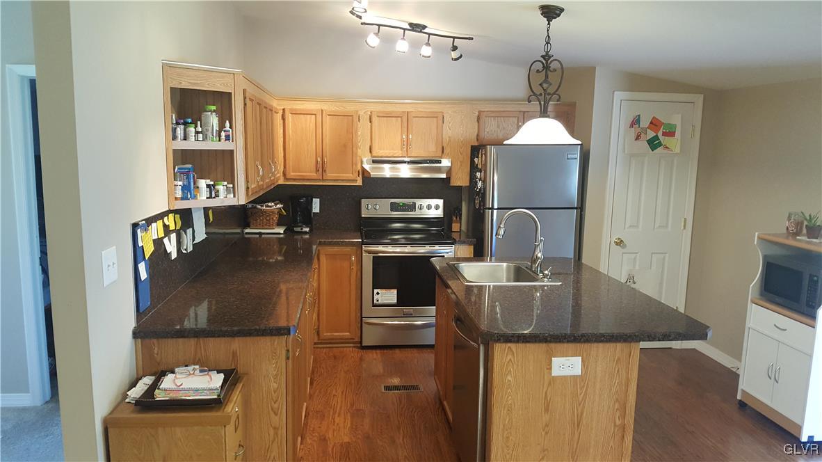 975 Bushkill Center Road Nazareth, PA 18064 - Photo 22 of 48 a kitchen with sink refrigerator and microwave