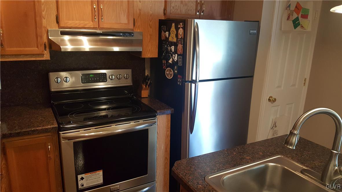 975 Bushkill Center Road Nazareth, PA 18064 - Photo 26 of 48 a metallic refrigerator freezer sitting in a kitchen